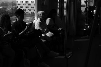 People sitting in city