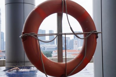 Close-up of rope in sea against sky