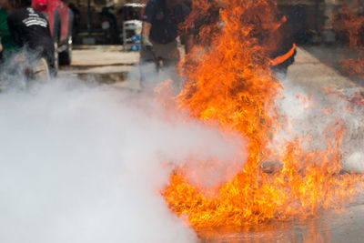 Scenic view of fire on rock