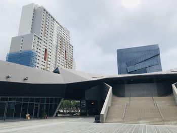 Low angle view of modern buildings against sky