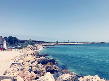 Scenic view of sea against clear blue sky