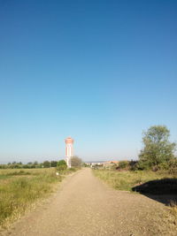 Empty road along landscape