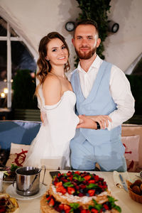 Portrait of smiling young couple