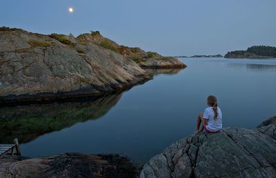 Girl on lakeshore