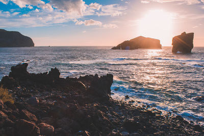 Scenic view of sea against sky during sunset