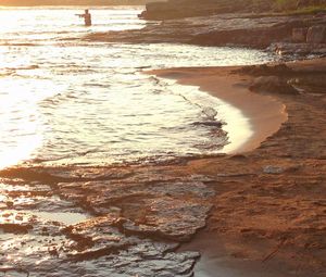 Scenic view of beach during sunset