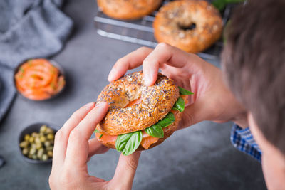 High angle view of man holding food