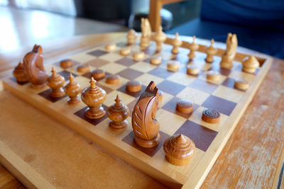 High angle view of chess pieces on table