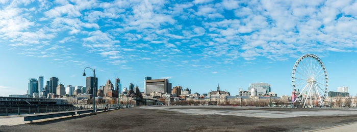 Buildings in city against sky