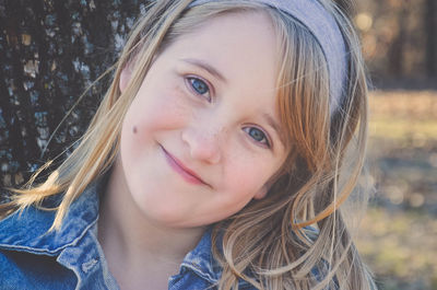 Close-up portrait of cute smiling girl