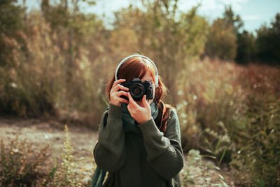 Man photographing with camera