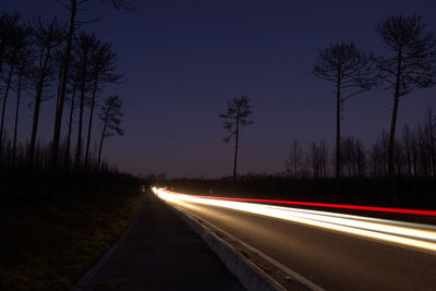 Light trails on road at night