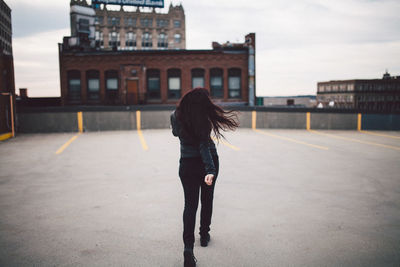 Woman walking on city street