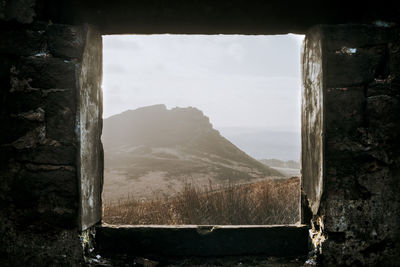 View of old ruin from window