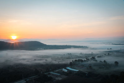 High angle view of landscape against sky during sunset