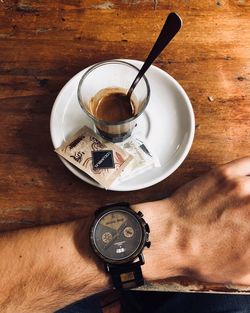 High angle view of coffee cup on table