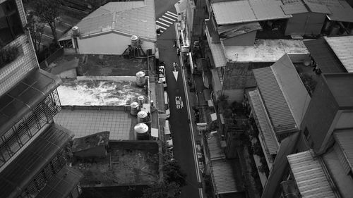 High angle view of steps amidst buildings in city