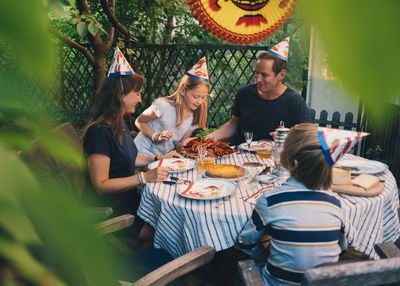 Family having garden dinner