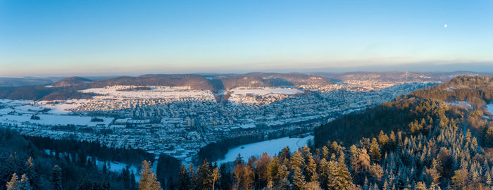 High angle view of snowcapped mountains against sky