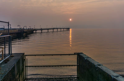 Smoky sky at the pier in des mooines, washington.