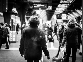 People at railroad station