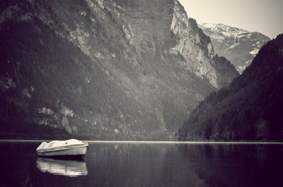 Scenic view of lake by mountains