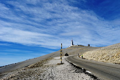 Scenic view of landscape against blue sky