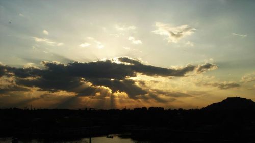 Scenic view of dramatic sky during sunset