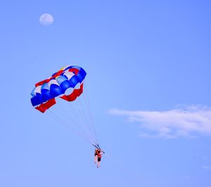 Parachute against blue sky