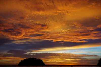 Low angle view of dramatic sky during sunset