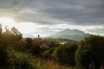 View of a esparreguera town at sunset, with montserrat in the background.