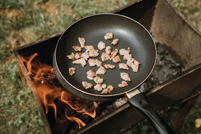 High angle view of food on barbecue grill