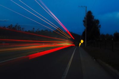 Light trails on road at night