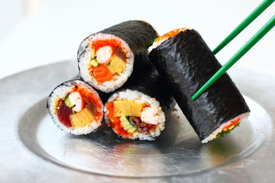 Close-up of sushi served in plate