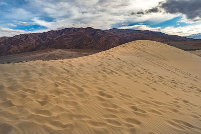 Scenic view of desert against sky