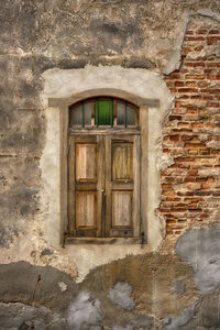 Closed window of old building