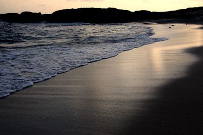 Scenic view of beach against sky
