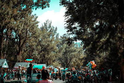 People in park against sky