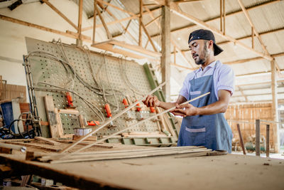 Portrait of man working at workshop