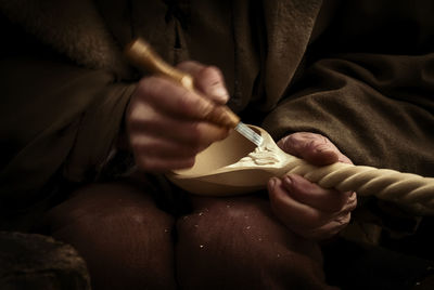 Close-up of man holding hands