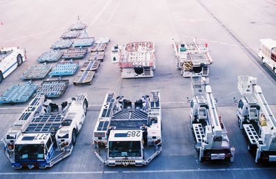 High angle view of vehicles on road in city