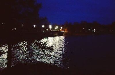 Reflection of illuminated buildings in water