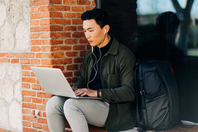 Young man using mobile phone