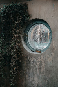 Reflection of building on glass window