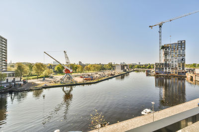 Bridge over river against clear sky