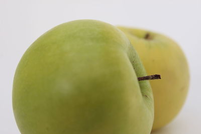 Close-up of apple against white background