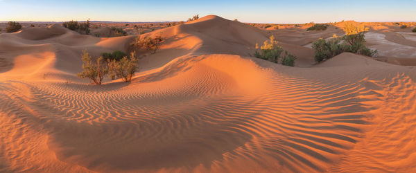 Panoramic view of desert against sky