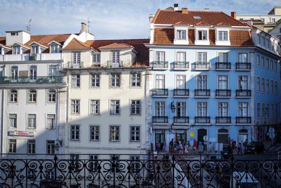 Buildings in city against sky