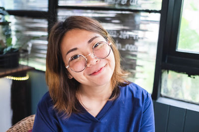 Portrait of smiling young woman