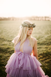 Young woman standing on land